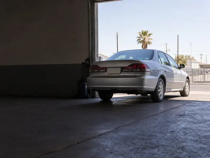Sedan leaving the shop with new tires